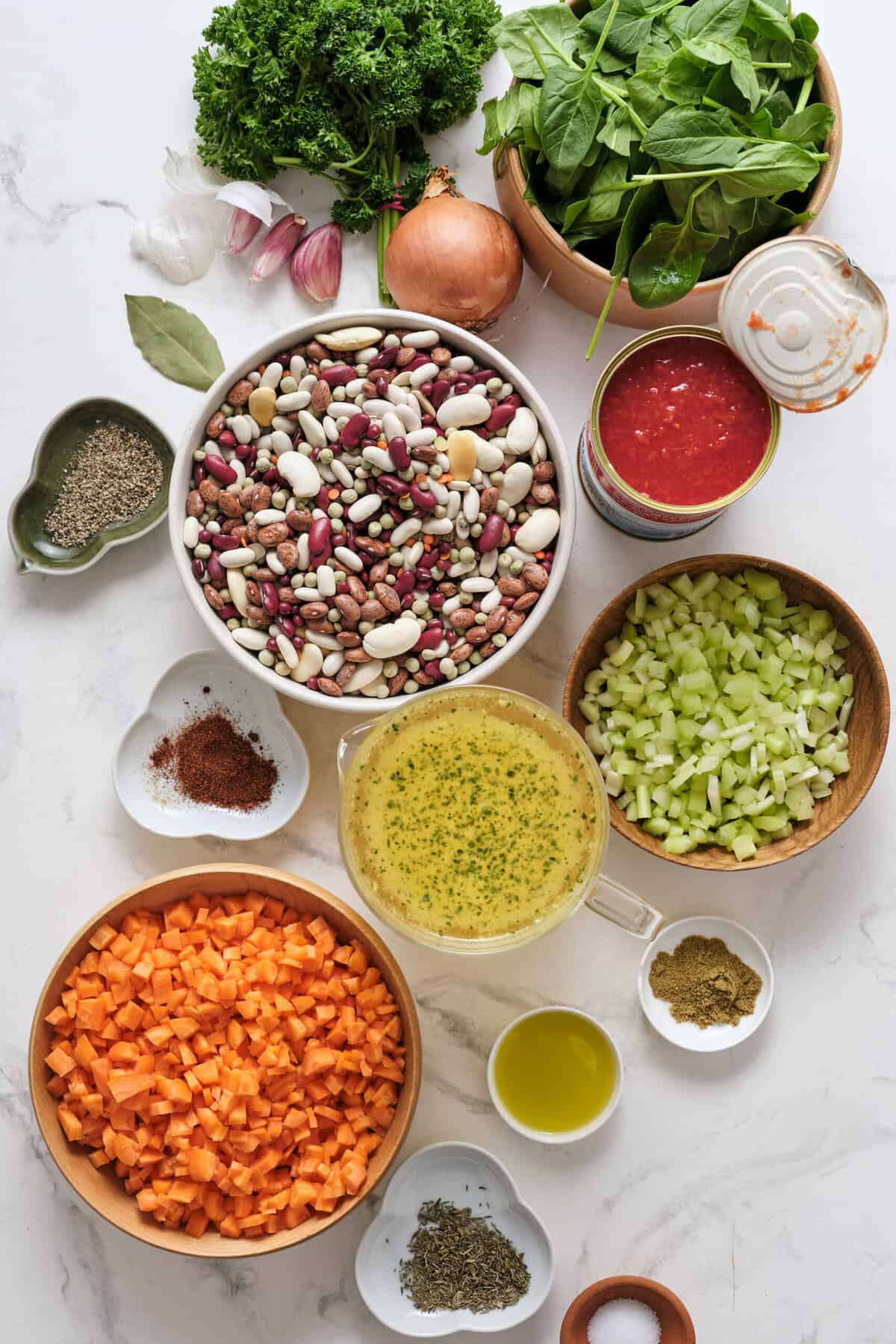 Organic vegetable medley with beans, diced carrots, celery, and fresh greens for healthy eating and plant-based meals.