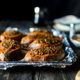 6 Ingredient Pecan Pie Twice Baked Sweet Potatotes - These tastes like pecan pie! They're the perfect sweet and savory, gluten free, healthy Thanksgiving side dish that's paleo and vegan friendly! | Foodfaithfitness.com | @FoodFaithFit