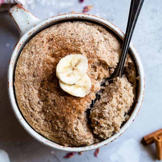 Easy Gluten Free Banana Bread Mug Cake - Want banana bread right now? Yes you do! Make this 5 minute, healthy, gluten free and paleo friendly banana bread in a mug! No waiting to cool nonsense! | #Foodfaithfitness | #Glutenfree #paleo #grainfree #bananabread #healthy