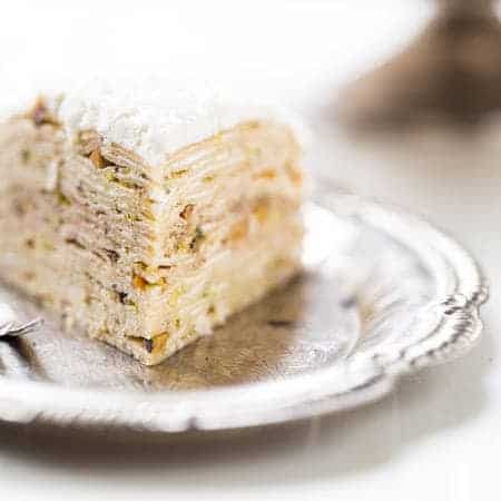 Coconut Pistachio Crepe Cake - A showstopping dessert that is surprisingly EASY! Perfect to impress at your Christmas table! | Foodfaithfitness.com | #recipe
