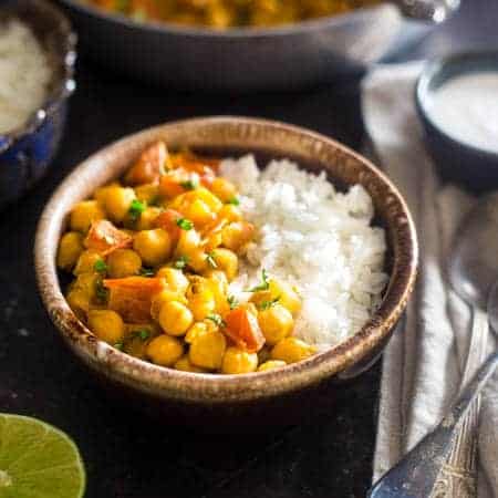 Vegan Chickpea Curry - A gluten free, 20-minute, weeknight dinner that's made extra creamy with coconut milk! It's perfect for a cozy, Meatless Monday meal! | Foodfaithfitness.com | @FoodFaithFit