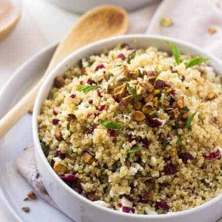 Pistachio Cherry And Feta Quinoa Salad - Crunchy, sweet and tangy this is SO easy and delicious! |www.foodfaithfitness.com| #Recipe #Quinoa #Salad