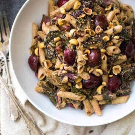 20 Minute White Wine and Goat Cheese Pasta with Rainbow Chard Recipe - SO easy, Gluten free and creamy! Perfect for a weeknight or romantic dinner at home! | Foodfaithfitness.com | #recipe