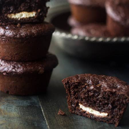 Healthy, Cream-Cheese Filled Chocolate Chip Muffins - Whole wheat and only 150 calories but SO moist and chocolatey! | Foodfaithfitness.com | #muffin #recipe #healthy