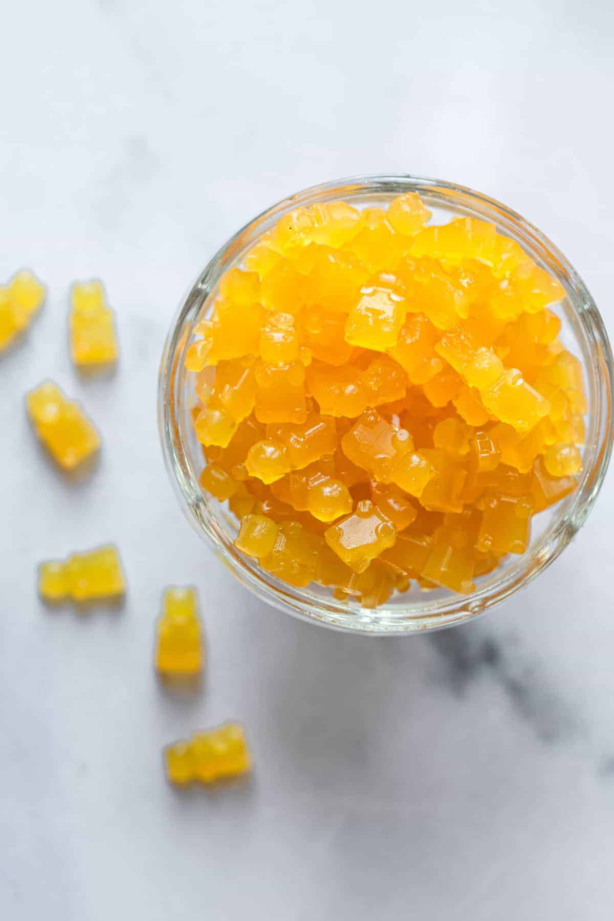 healthy gummies in a glass with some on the side