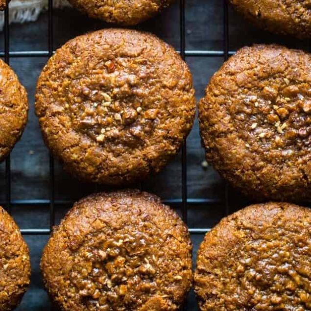 Pecan Pie Paleo Cookies - These easy cookies taste like pecan pie INSIDE a cookie because they have a sticky-sweet, crunchy pecan center! You'll never guess they're gluten free and healthier treat for the holidays! | Foodfaithfitness.com | @FoodFaithFit