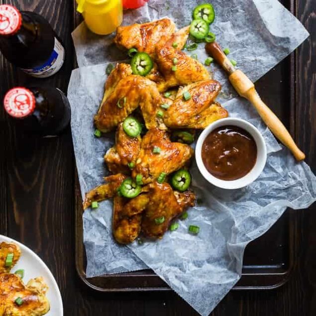 Slow Cooker BBQ Chicken Wings - Let the slow cooker do the work for you with these easy paleo-friendly chicken wings! A healthy, gluten, grain and dairy free, crowd pleasing appetizer for game day! | Foodfaithfitness.com | @FoodFaithFit