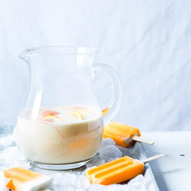 Creamsicle Cashew Milk - This quick and easy, 4 ingredient cashew milk recipe tastes like a creamsicle! It's a paleo, vegan and whole30 compliant drink that tastes better than store bought! | Foodfaithfitness.com | @FoodFaithFit