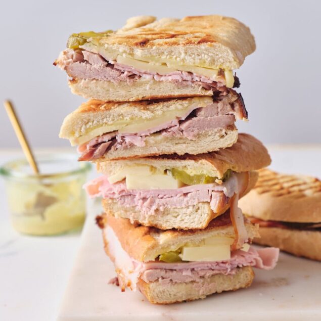 Freshly made sub sandwiches with lean meats, cheese, and crispy bread, showcasing healthy meal options from Food Faith Fitness. Perfect for a nutritious lunch or dinner.