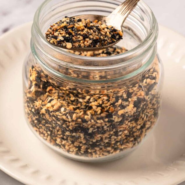 Minced garlic in a glass jar, ready to use for healthy recipes, meal prep, and cooking. Perfect for adding flavor to dishes with a healthy twist on food and fitness goals.