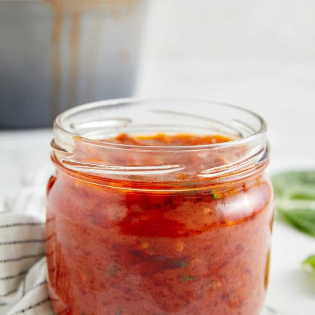 Homemade salsa in glass jar, fresh, flavorful, and healthy dip for meals and snacks. Perfect for meal prep, adding to Mexican dishes or as a versatile condiment. Bright, fresh ingredients make this salsa a wholesome addition.