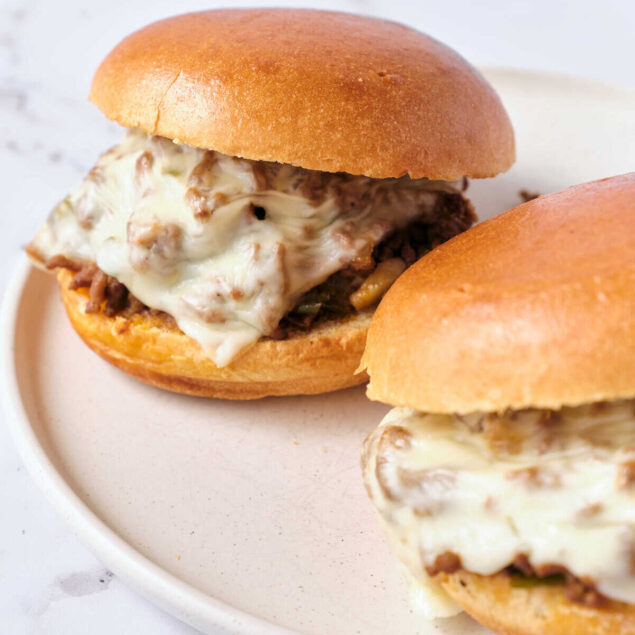 Savory cheeseburger sliders with melted cheese on soft buns, perfect for healthy meal ideas and comfort food recipes.