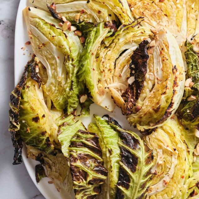 ROASTED BALSAMIC LETTUCE WEDGE SALAD with crunchy toasted almonds, a healthy, low-carb, and flavorful side dish perfect for meal prep, healthy eating, and nutritious recipes.
