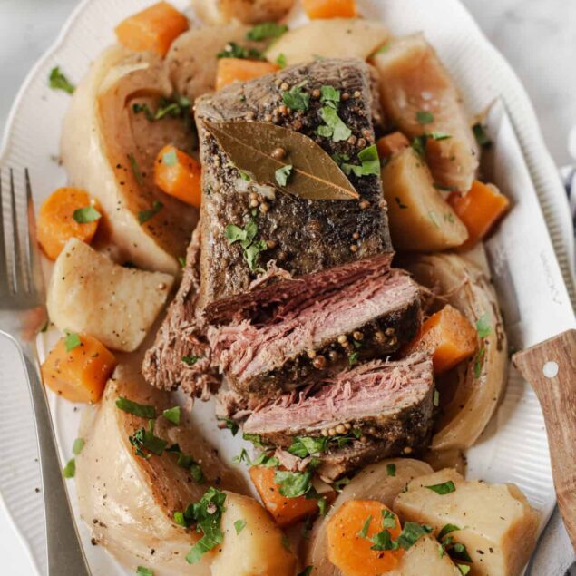 Slow cooker pot roast with carrots and potatoes, perfect for healthy, hearty meals and meal prep inspired by food and fitness recipes.