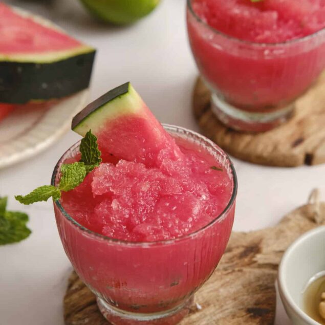 Refreshing watermelon and mint slush in glass cups, perfect healthy summer drink for weight loss and fitness.