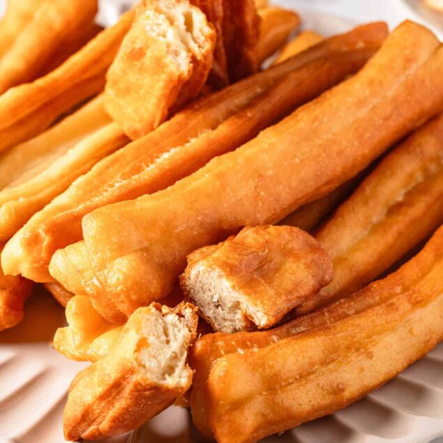 Golden crispy homemade churros served with a soft, fluffy interior perfect for a healthy snack alternative or indulgent treat. Ideal for food lovers seeking nutritious yet delicious recipes.