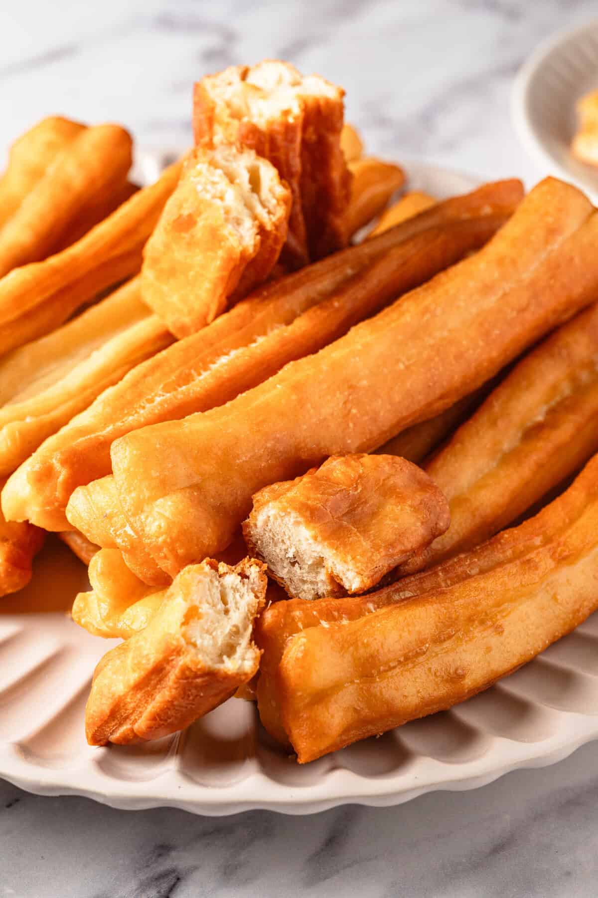 Golden crispy homemade churros served with a soft, fluffy interior perfect for a healthy snack alternative or indulgent treat. Ideal for food lovers seeking nutritious yet delicious recipes.