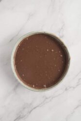 Silky smooth healthy hot chocolate made with almond milk and cacao, perfect for cozy winter nights.