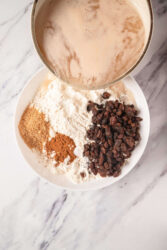 Sweet potato baking ingredients including raisins, flour, cinnamon, and brown sugar for healthy recipes.