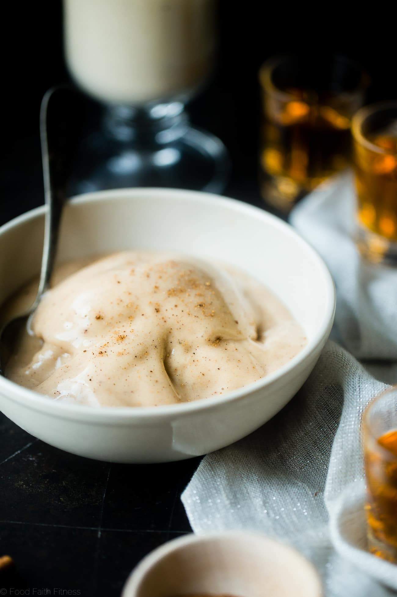 Vegan Rum and "Egg Nog" Ice Cream - This creamy, coconut milk ice cream tastes like frosty version of drinking a rum and eggnog...without the dairy or eggs! It's a healthy treat for the holidays! | Foodfaithfitness.com | @FoodFaithFit