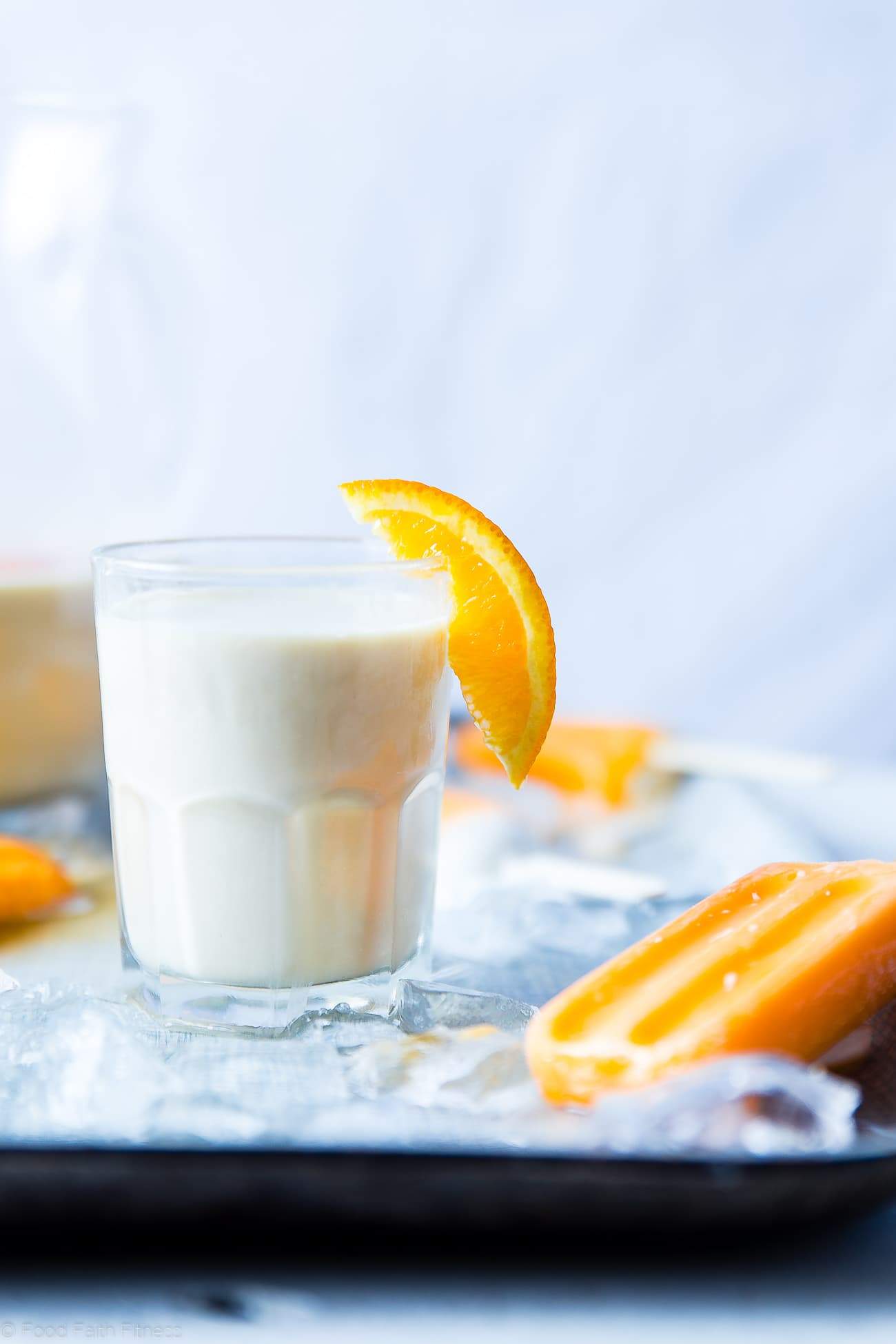 Creamsicle Cashew Milk - This quick and easy, 4 ingredient cashew milk recipe tastes like a creamsicle! It's a paleo, vegan and whole30 compliant drink that tastes better than store bought! | Foodfaithfitness.com | @FoodFaithFit