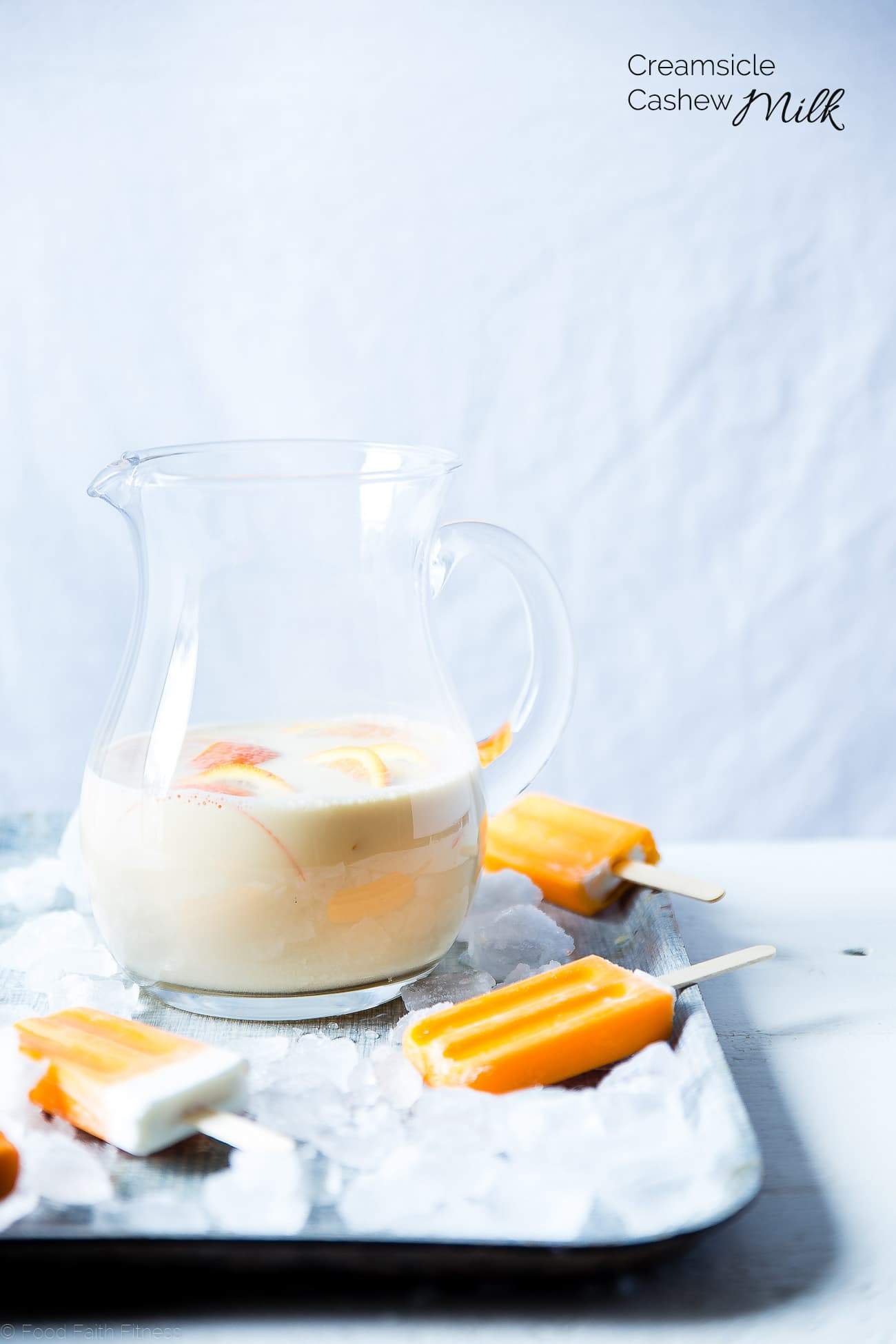Creamsicle Cashew Milk - This quick and easy, 4 ingredient cashew milk recipe tastes like a creamsicle! It's a paleo, vegan and whole30 compliant drink that tastes better than store bought! | Foodfaithfitness.com | @FoodFaithFit