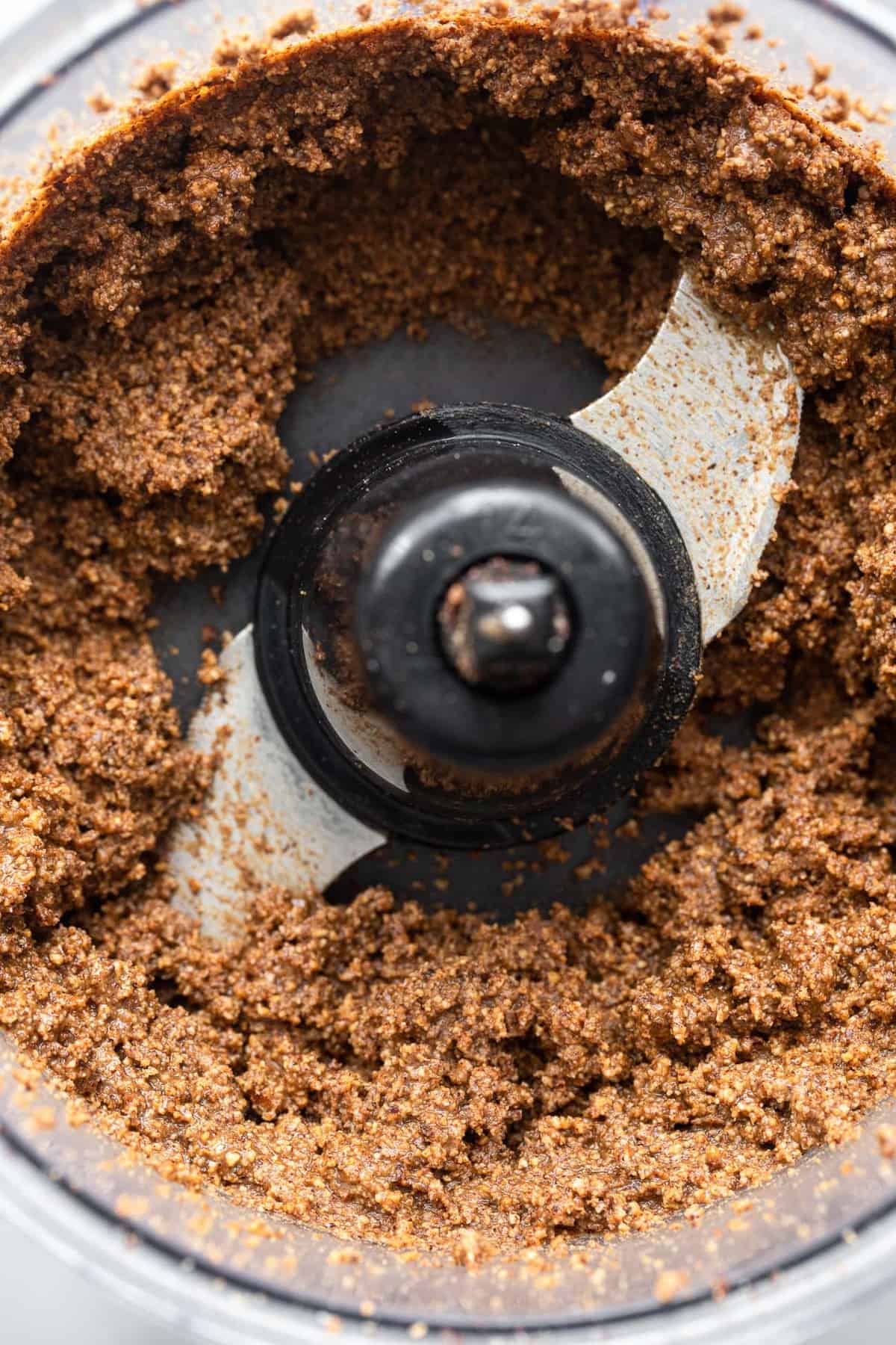 pecan nut butter being made in a food processor