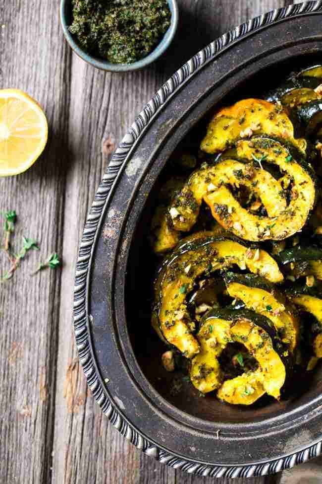 Pamesan Toasted Acorn Squash with Sage Kale Pesto - An easy side dish that is perfect for entertaining or a weeknight dinner! | Foodfaithfitness.com | #recipe