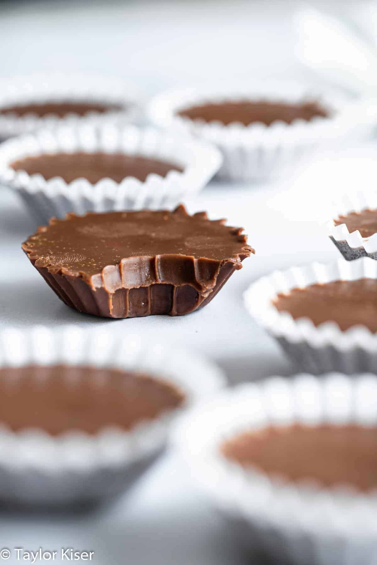 chocolate fat bombs with a bite taken out of one