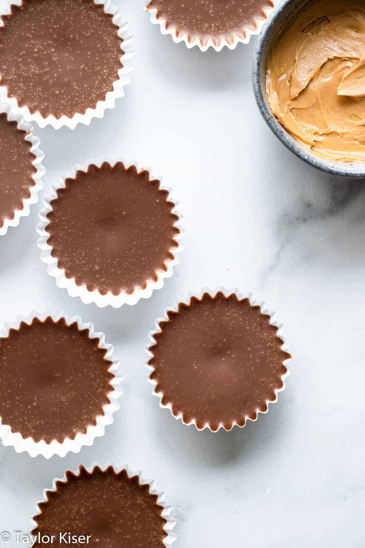 peanut butter chocolate fat bombs on a table