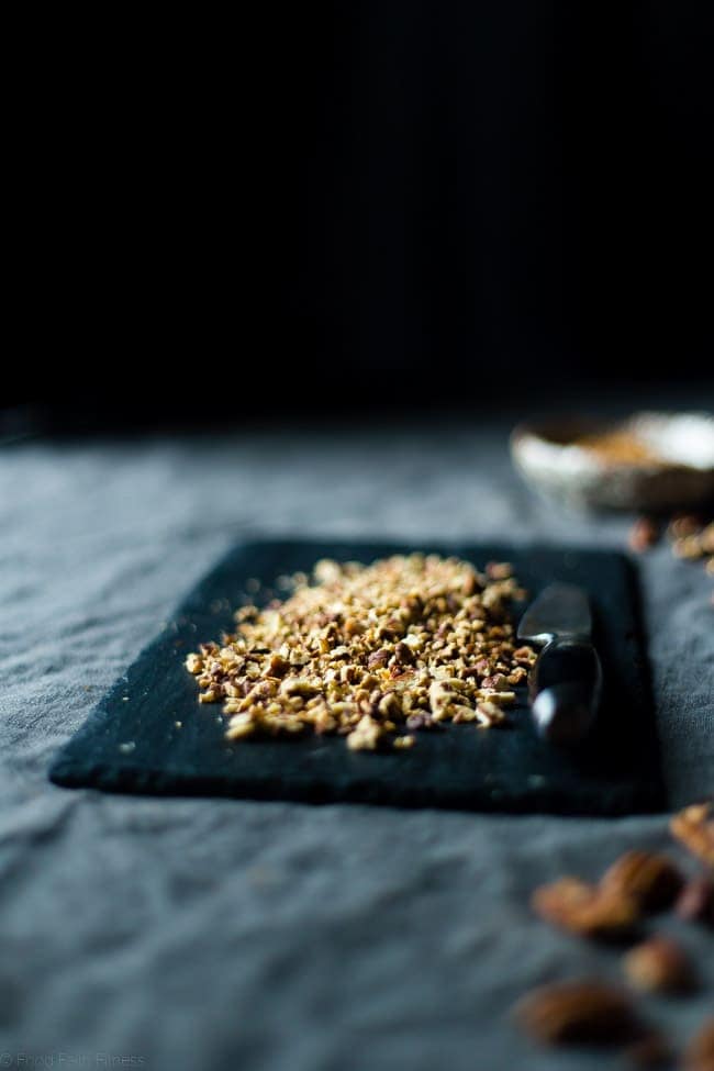 Pecan Pie Paleo Cookies - These easy cookies taste like pecan pie INSIDE a cookie because they have a sticky-sweet, crunchy pecan center! You'll never guess they're gluten free and healthier treat for the holidays! | Foodfaithfitness.com | @FoodFaithFit