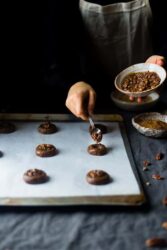 Pecan Pie Paleo Cookies - These easy cookies taste like pecan pie INSIDE a cookie because they have a sticky-sweet, crunchy pecan center! You'll never guess they're gluten free and healthier treat for the holidays! | Foodfaithfitness.com | @FoodFaithFit