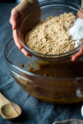 Pecan Pie Paleo Cookies - These easy cookies taste like pecan pie INSIDE a cookie because they have a sticky-sweet, crunchy pecan center! You'll never guess they're gluten free and healthier treat for the holidays! | Foodfaithfitness.com | @FoodFaithFit