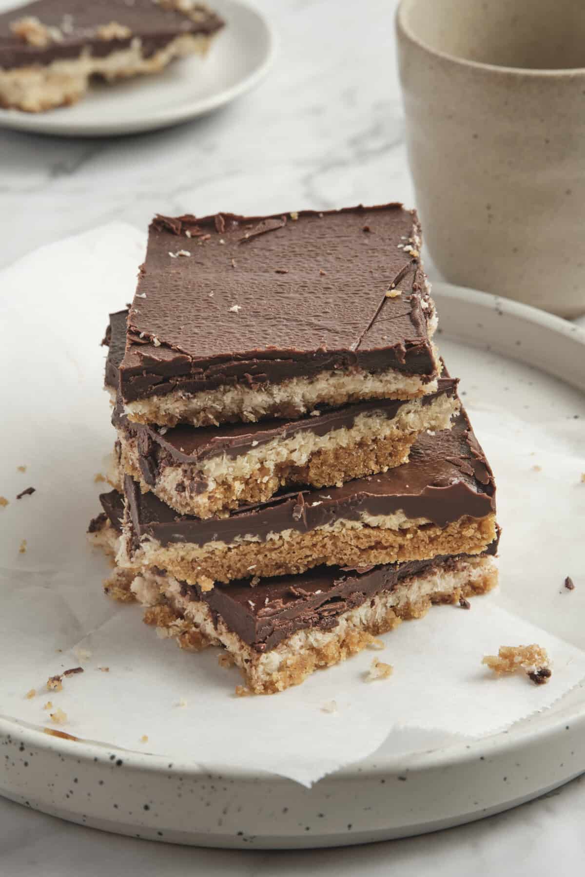 Decadent homemade chocolate and peanut butter dessert bars, perfect for healthy recipes, sweet snacks, and indulgent treats from Food Faith Fitness.