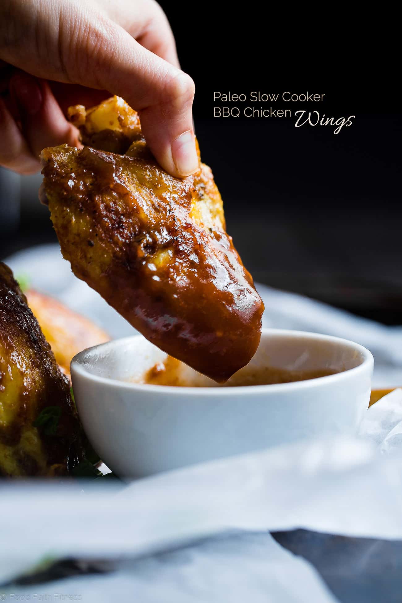 Slow Cooker BBQ Chicken Wings - Let the slow cooker do the work for you with these easy paleo-friendly chicken wings! A healthy, gluten, grain and dairy free, crowd pleasing appetizer for game day! | Foodfaithfitness.com | @FoodFaithFit