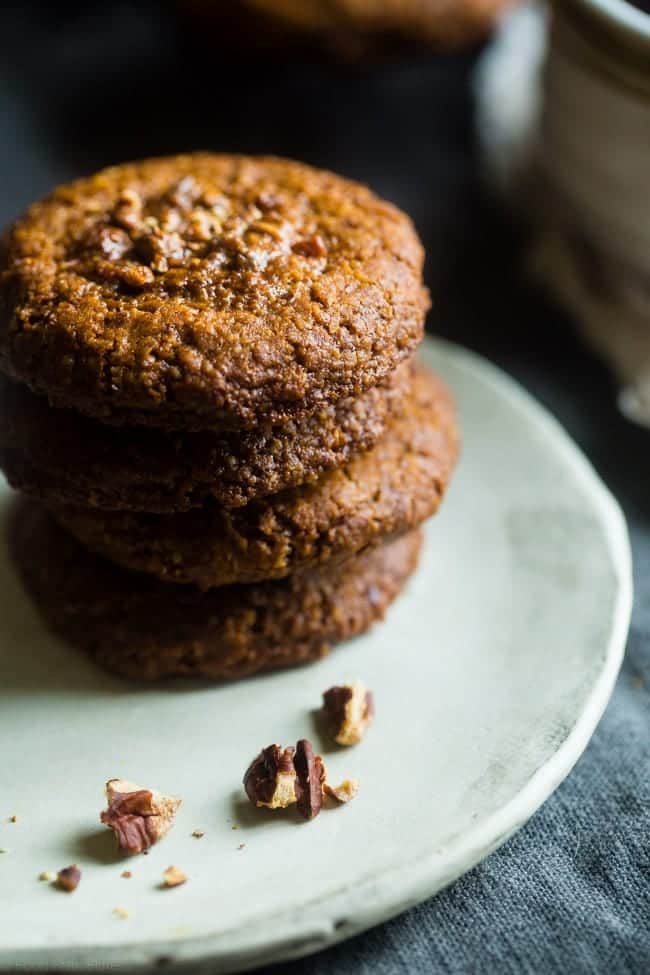 Pecan Pie Paleo Cookies - These easy cookies taste like pecan pie INSIDE a cookie because they have a sticky-sweet, crunchy pecan center! You'll never guess they're gluten free and healthier treat for the holidays! | Foodfaithfitness.com | @FoodFaithFit